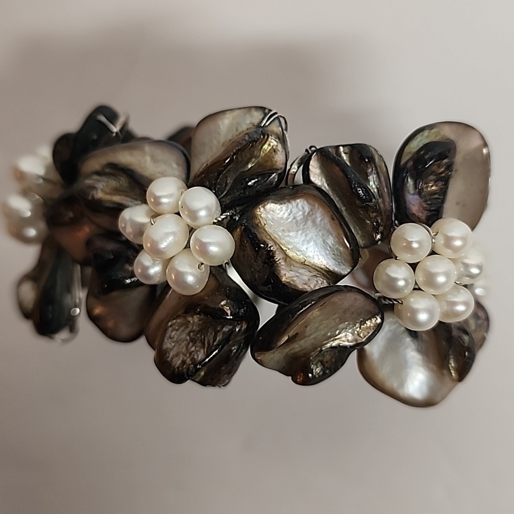 Elegant beautiful tropical happy floral shell and pearl adjustable bracelet.